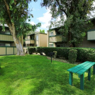 Property building exterior and picnic area with seating